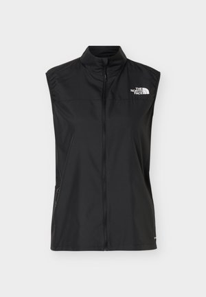 Μαύστο αμάνικο γιλέκο με φερμουάρ και όρθιο γιακά, πλαϊνές τσέπες με φερμουάρ και λευκό λογότυπο The North Face στο στήθος.