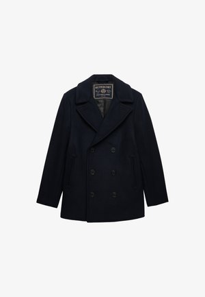 Marineblauer doppelt geknöpfter Pea Coat mit großen Revers, sechs schwarzen Knöpfen, zwei seitlichen Vertikal-Taschen und einem Superdry-Label innen am Kragen.