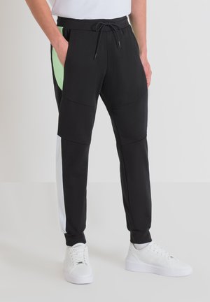 RUBBER LOGO PRINT - Pantalon de survêtement - black