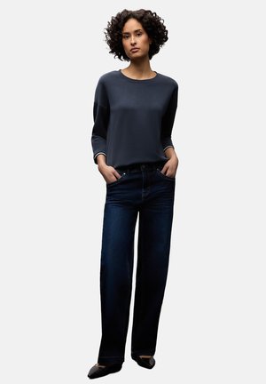 - Bluzka z długim rękawem