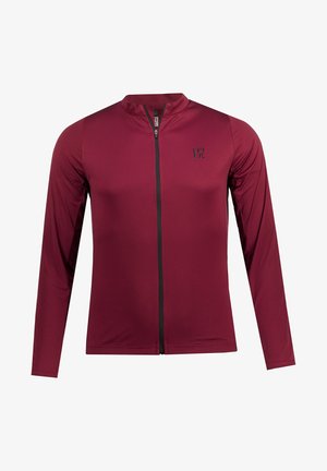 Bordeaux langærmet cykeljakke med en tætsiddende pasform, frontlynlås og subtilt struktureret mønster. Sorte accenter og logo på brystet.