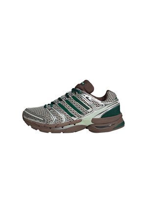 Running shoe with a mesh upper in silver and green, featuring brown accents, a padded collar, and prominent cushioning sole design.