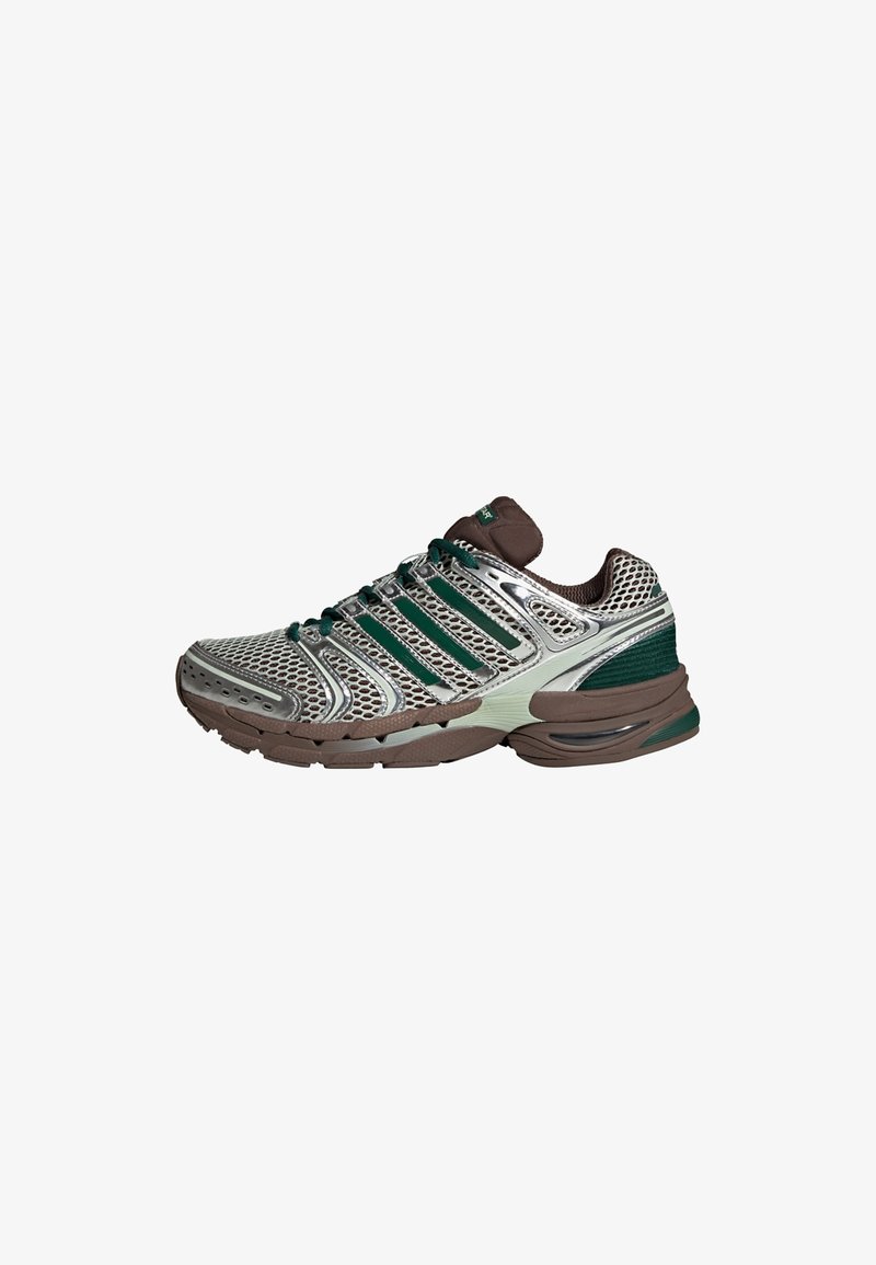 Running shoe with a mesh upper in silver and green, featuring brown accents, a padded collar, and prominent cushioning sole design.