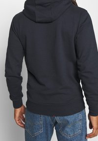 Ellesse Mikina s kapucí - dark blue