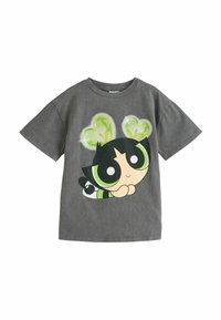 Grå bomulds T-shirt med et stort grafisk motiv af en tegneseriefigur med grønne øjne og hjerter over hovedet. Korte ærmer og rund halsudskæring.