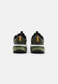Puma CELL GLARE UNISEX - Tenisice za trening - dark olive/sun stream/black