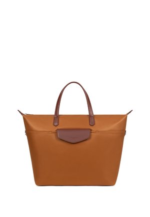 Brown leather tote bag with two handles and a small front flap pocket, set against a plain white background.