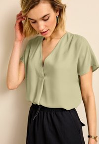 Next SHORT SLEEVE OVERHEAD STANDARD - Pusero - sage green