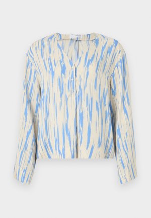 Kerge, beež pluus, millel on sinine triibumuster, V-avaga, nööbiga kaunistus ja pikad varrukad. Pehme tekstuur, mugav lõige ja lühendatud disain.