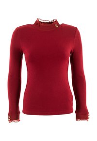 Maglione a maniche lunghe rosso a costine con un collo alto arricciato, caratterizzato da dettagli con bottoni dorati sulla spalla e pizzo sui polsini.