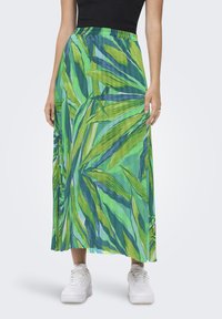 Gonna lunga verde con un motivo di foglie botaniche in diverse tonalità di verde. Realizzata in un tessuto leggero, presenta una vita elastica.