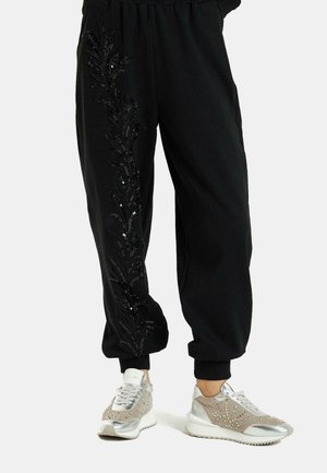 Alma en Pena Pantalones deportivos - nero