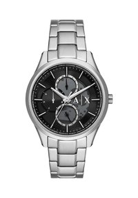 Hõbedane roostevabast terasest kell, millel on ümmargune must kell face, kolm alamdialki ja hõbedased tunni markerid. Omab poleeritud lingitud rihma.