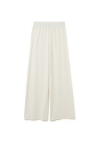 Pantalons larges beige clair en tissu doux. Dotés d'une taille élastique, d'une texture lisse et sans motifs ni détails matériels visibles.