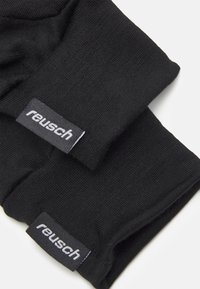 Black knit gloves featuring a smooth texture and reinforced cuffs. Each glove displays a rectangular label with "reusch" in white text.