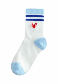 Cotton socks in white with blue stripes at the top. Red lobster graphic on the front and light blue heel and toe sections.