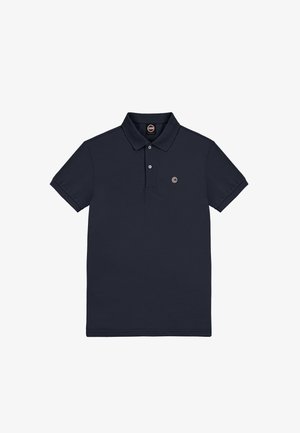 Polo shirt blu navy realizzato in morbido tessuto, con colletto classico, maniche corte e un logo circolare sulla parte sinistra della tasca del petto.