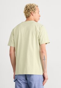Carhartt WIP POCKET - T-shirts - beryl