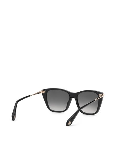 Lunettes de soleil noires forme œil de chat avec verres foncés dégradés et fines branches en métal doré, présentées sur fond blanc.
