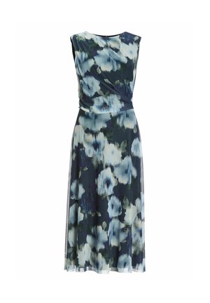 Robe sans manches à motifs floraux avec un design croisé, sur une base bleu foncé avec de grands motifs floraux bleu clair et verts, fabriquée en tissu léger.