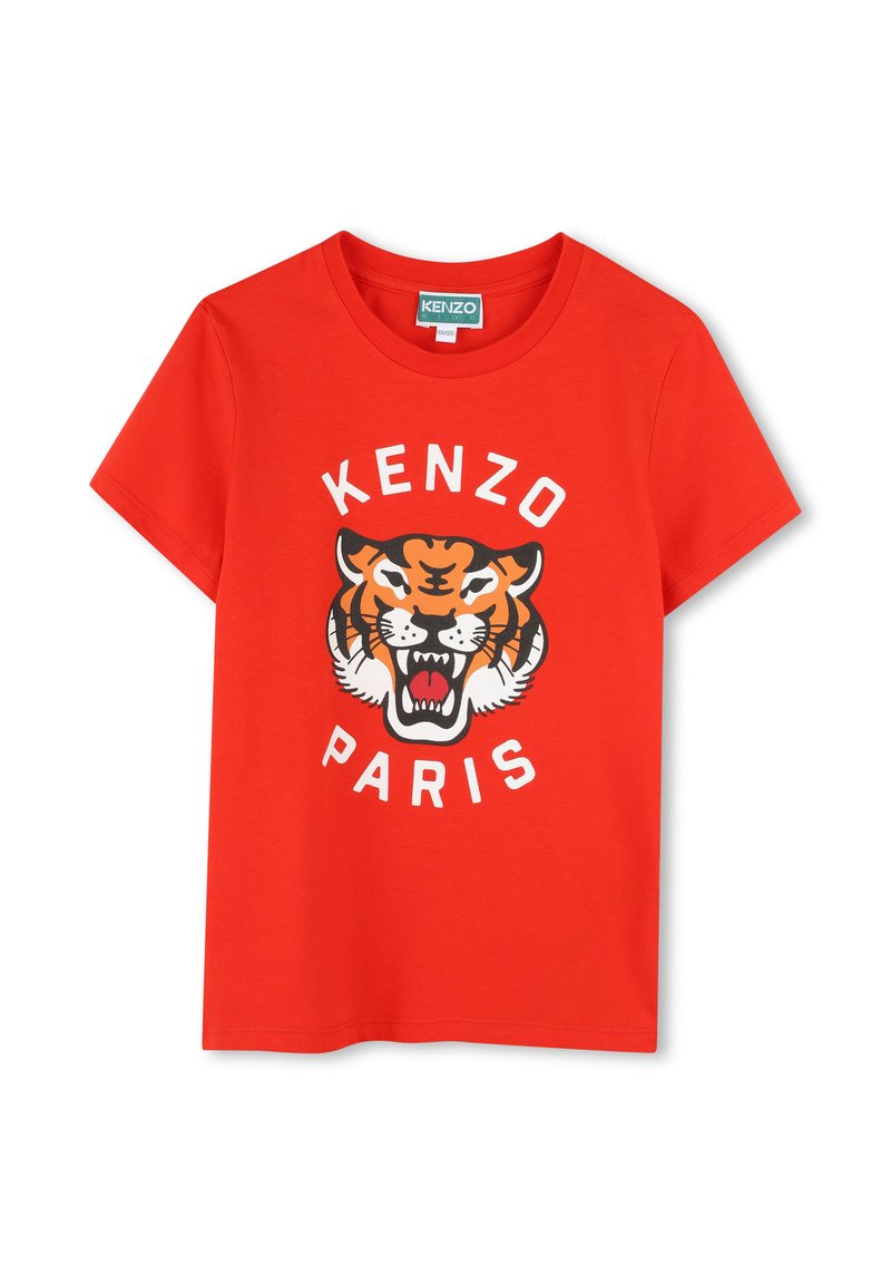 T-shirt en coton rouge avec un graphique de tigre et le texte "KENZO PARIS" en blanc, col rond, manches courtes et coupe décontractée.