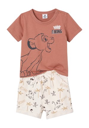 Rust-colored toddler shirt with Simba graphic and "The Lion King" text, paired with white shorts featuring animal and palm tree prints.