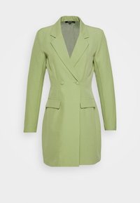 Dubbelknäppt blazer i ljusgrön tyg, med notchade avslut, långa ärmar och två framfickor. Slät struktur och skräddarsydd passform.