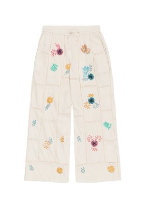 Pantaloni larghi color crema realizzati in tessuto leggero, con ricami floreali colorati e dettagli in pizzo lungo le cuciture.