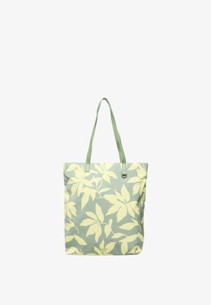 Sac fourre-tout avec des anses vert clair et un grand motif de feuilles tropicales jaune pâle sur un fond vert atténué.