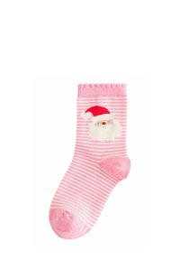 Rosa gestreifte Socke mit einem gerippten Bündchen, das ein weißes Santa-Gesicht mit rotem Hut und rosigen Wangen zeigt. Weicher, gemischter Stoff.