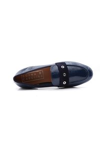 Navy blue leather loafer with shiny texture, contrasted by a matte black suede band and silver hardware accents.