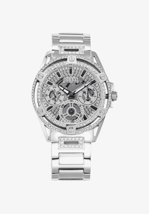 Montre en argent avec un bracelet en acier inoxydable, des accents en cristal et un cadran détaillé comportant plusieurs sous-cadrans et un fond texturé.