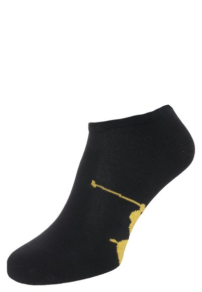 Meia preta de tornozelo feita de algodão com um padrão texturizado. Apresenta um design gráfico amarelo de um golfista em movimento ao lado.