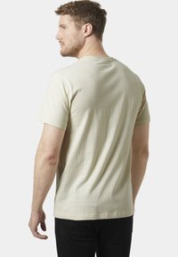 Helly Hansen CORE GRAPHIC - Camiseta estampada - cream