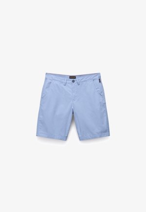 Light blue shorts made of soft cotton. Features two front pockets, a zip fly, and a button closure. Plain design with subtle stitching detail.