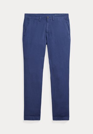 Pantalon décontracté slim-fit bleu marine pour homme avec passants de ceinture, fermeture avant par bouton et zip, et poches latérales, posé à plat sur fond blanc.