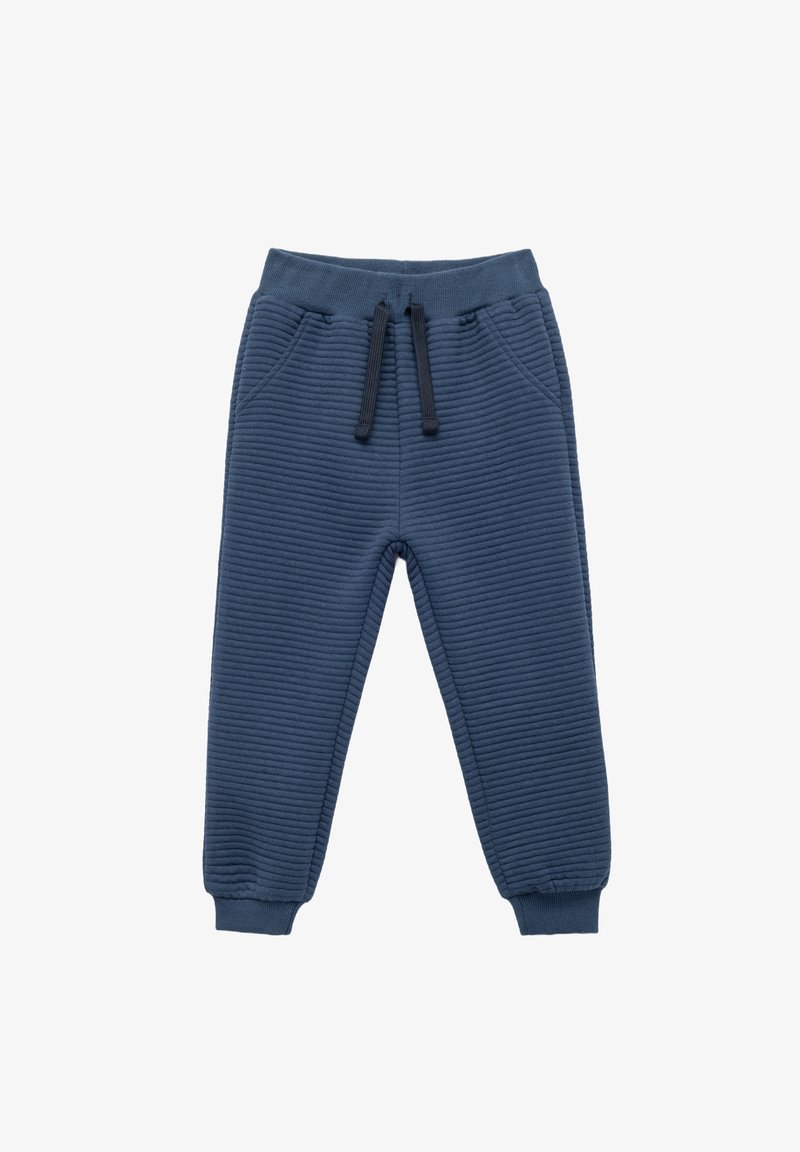 Navy blue sweatpants made of ribbed material. Features an elastic waistband with drawstring, side pockets, and tapered cuffs.