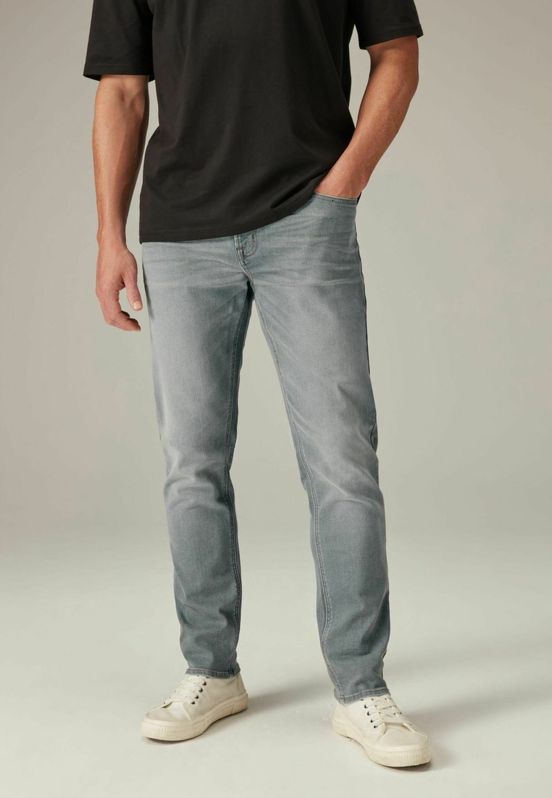 Next MOTION FLEX STRETCH - Prigludę džinsai - mottled light grey