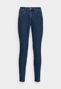 Jeans skinny de mezclilla azul oscuro con un diseño clásico de cinco bolsillos, sutiles acentos de costura y una cremallera con cierre de botón.