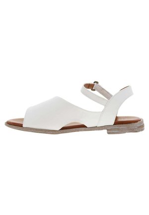 White leather sandal with an open toe design, adjustable ankle strap, and a textured light brown sole. Features a smooth finish.