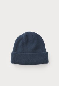 Navy blue knit beanie with a folded cuff, made of a soft fabric with ribbed texture, featuring a seamless crown design.