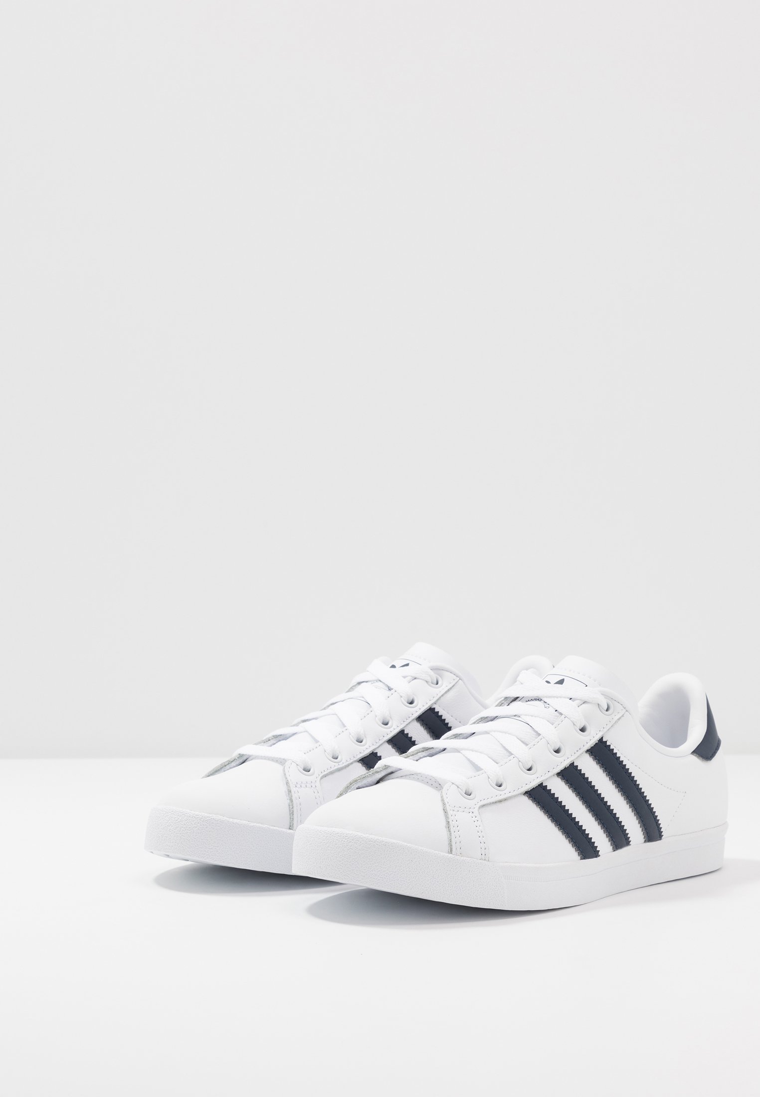 white coast star trainers