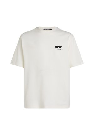 Tricou alb din bumbac cu guler rotund și mâneci scurte. Prezentă un grafic cu ochelari de soare negri și textul "KARL LAGERFELD" pe partea stângă a pieptului.