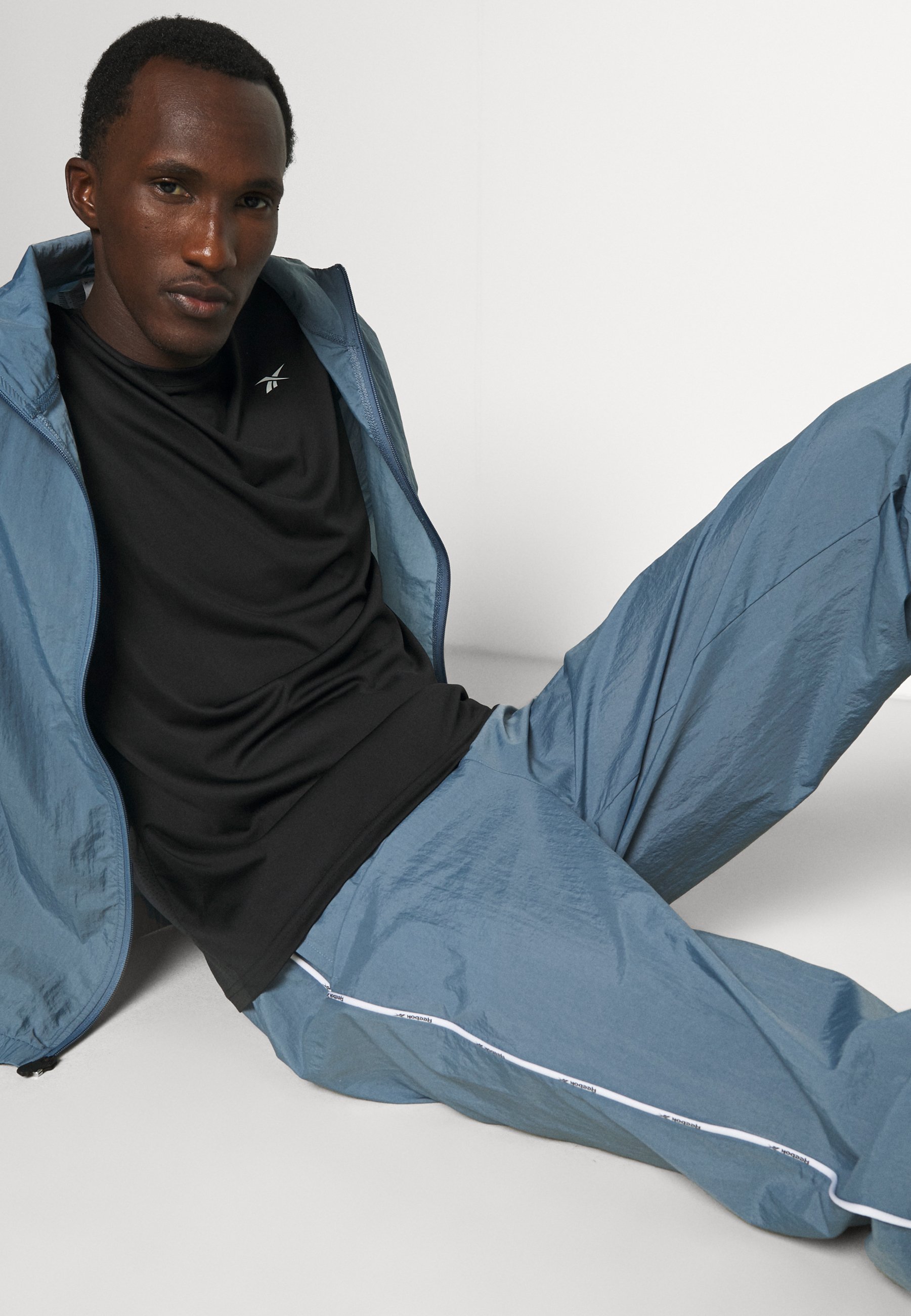 Conjunto de chándal Piping - Azul Reebok | Reebok España