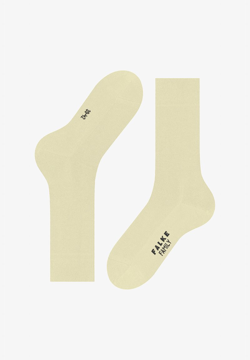Lichtgele sportsokken van zacht materiaal. Ze hebben een gladde textuur, standaard vorm en zwarte "FALKE FAMILY" branding.
