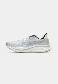 Light gray running shoe with mesh upper, thick white cushioned sole, black inner lining, and gum-colored outsole, shown in side profile.