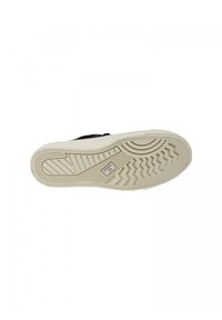 Suola nera con una superficie testurizzata, dotata di una suola in gomma di colore crema. Include un logo sulla mezze suola e un motivo di battistrada distintivo.