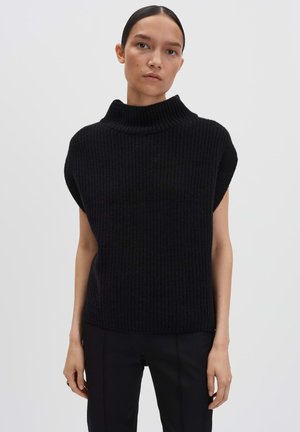 Maglione senza maniche in maglia nera con colletto alto a coste e vestibilità rilassata, caratterizzato da ampie aperture per le braccia e un tessuto testurizzato.