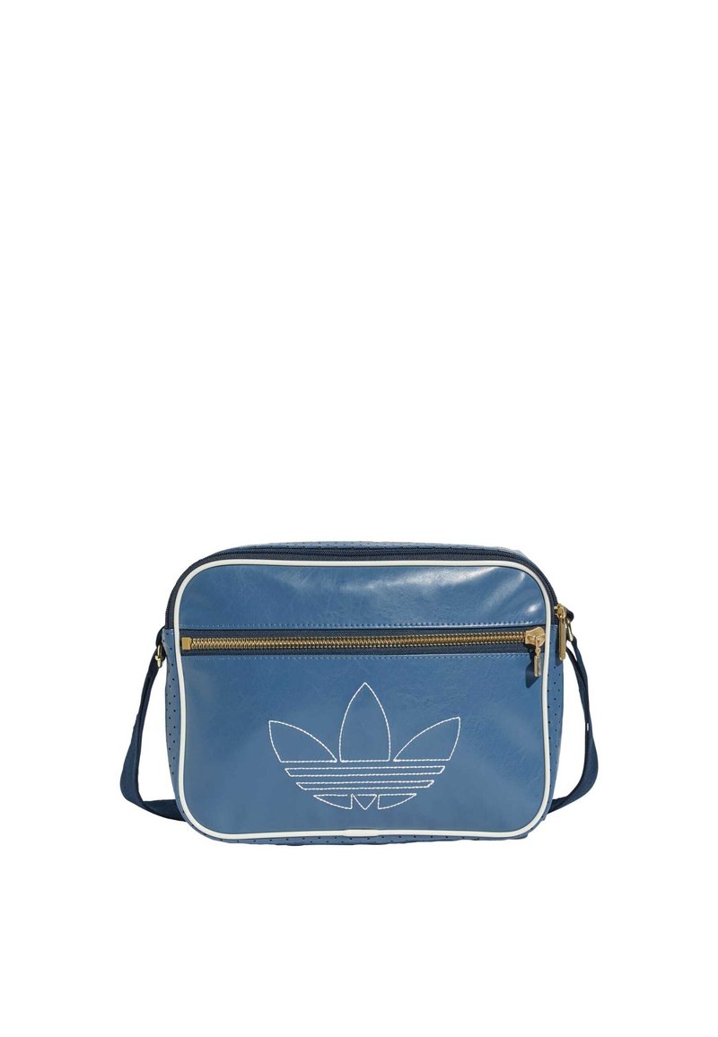 Borsa crossbody sintetica blu con tasca con zip, piping bianco e logo ricamato sul davanti, caratterizzata da un design laterale perforato.