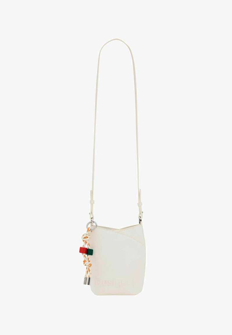 Small off-white crossbody bag with long strap, twisted orange and white cord, and red and green rectangular beads attached to a metal ring.